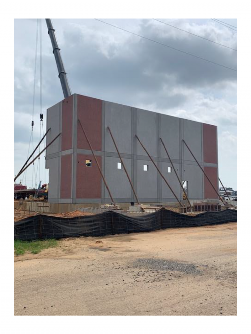 A wall of the dewatering facility being erected